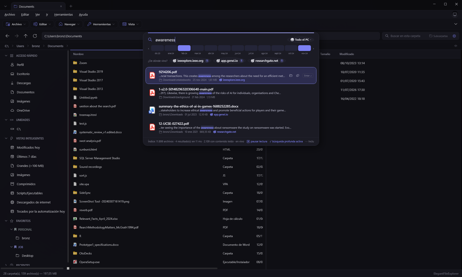 El Buscador sobre la app: búsqueda por contenido en todo el PC con resultados en milisegundos, fragmentos resaltados, origen de cada descarga y filtros por mes