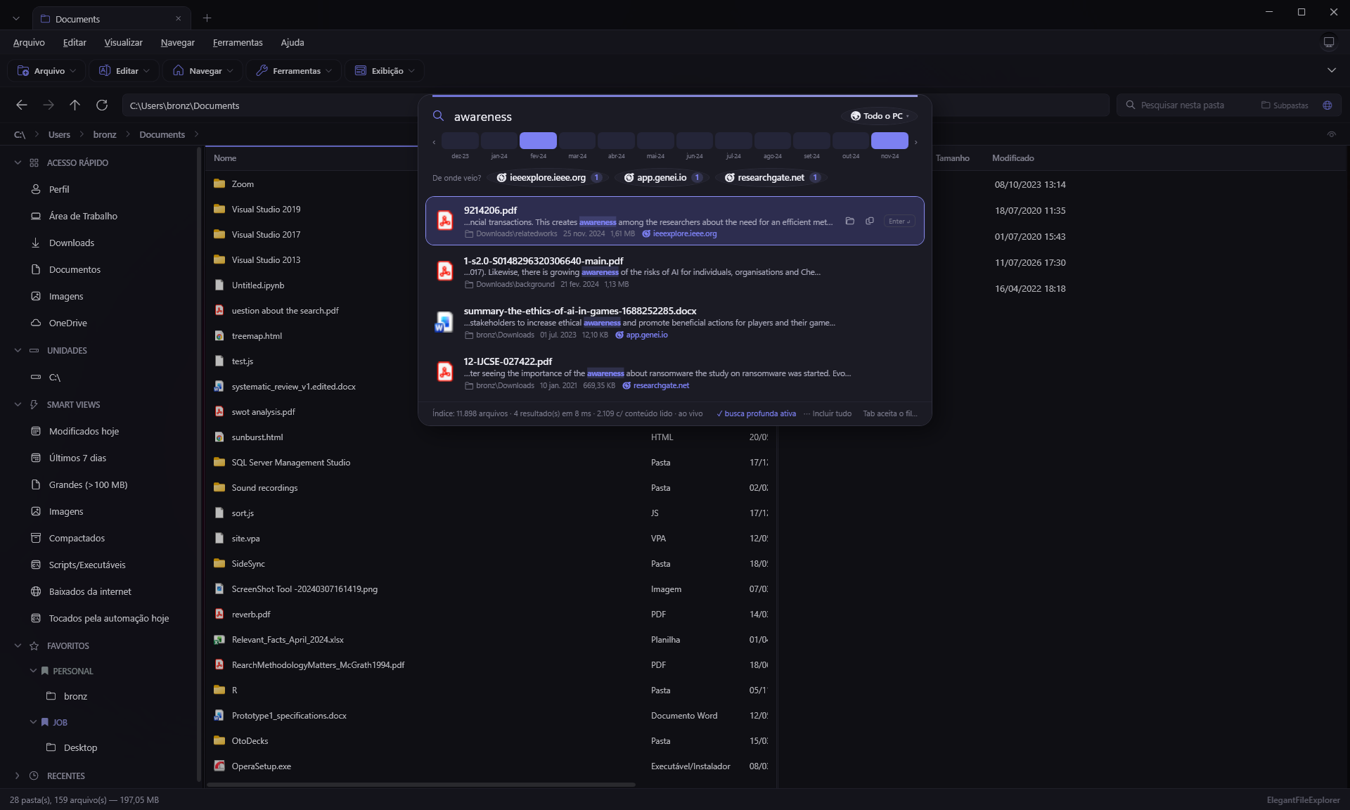 O Achador aberto sobre o app: busca por conteúdo em todo o PC com resultados em milissegundos, trechos destacados, origem de cada download e filtros por mês