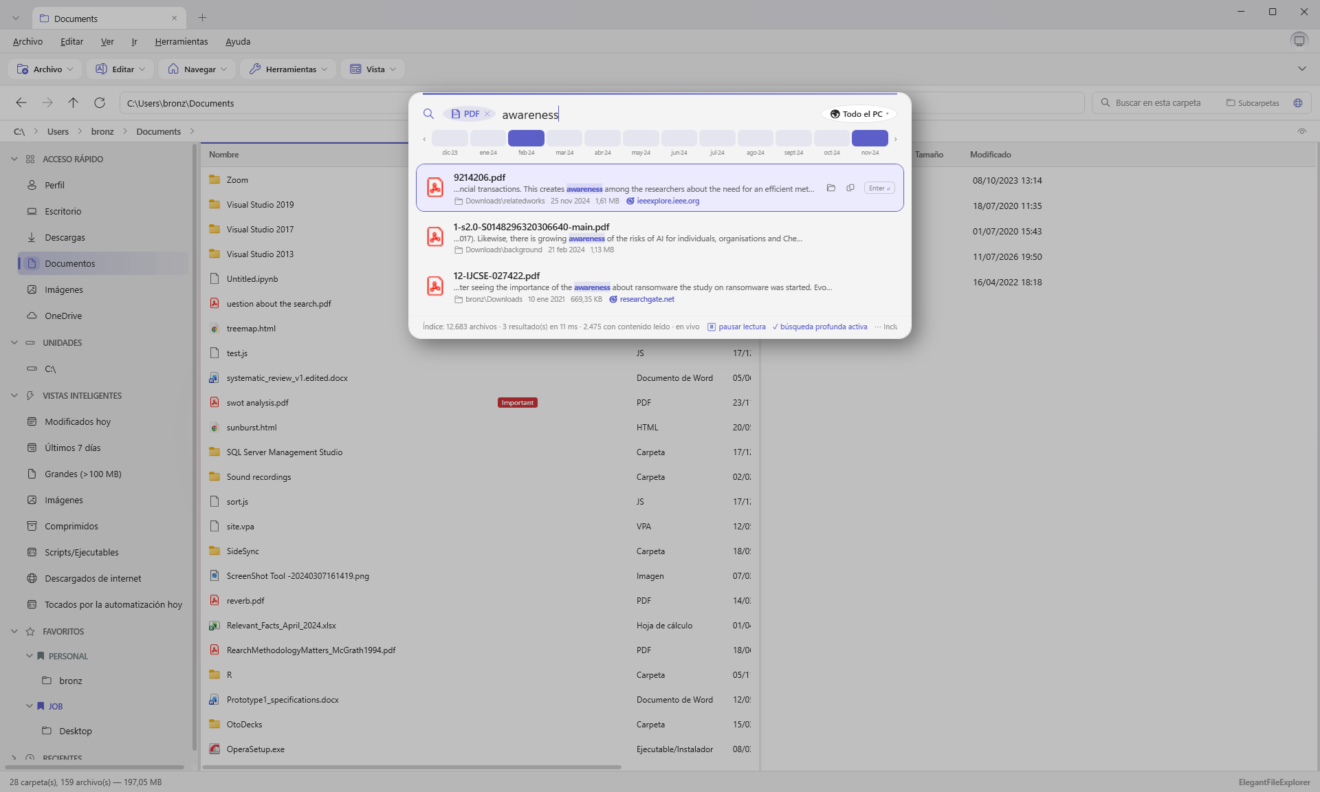 El Buscador sobre la app: búsqueda por contenido en todo el PC con resultados en milisegundos, fragmentos resaltados, origen de cada descarga y filtros por mes